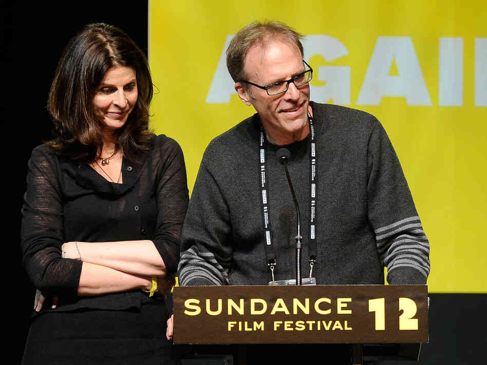 Producer Amy Ziering and Director Kirby Dick accept an award at this year's Sundance Film Festival for their documentary The Invisible War, which looks at sex crimes in the military.