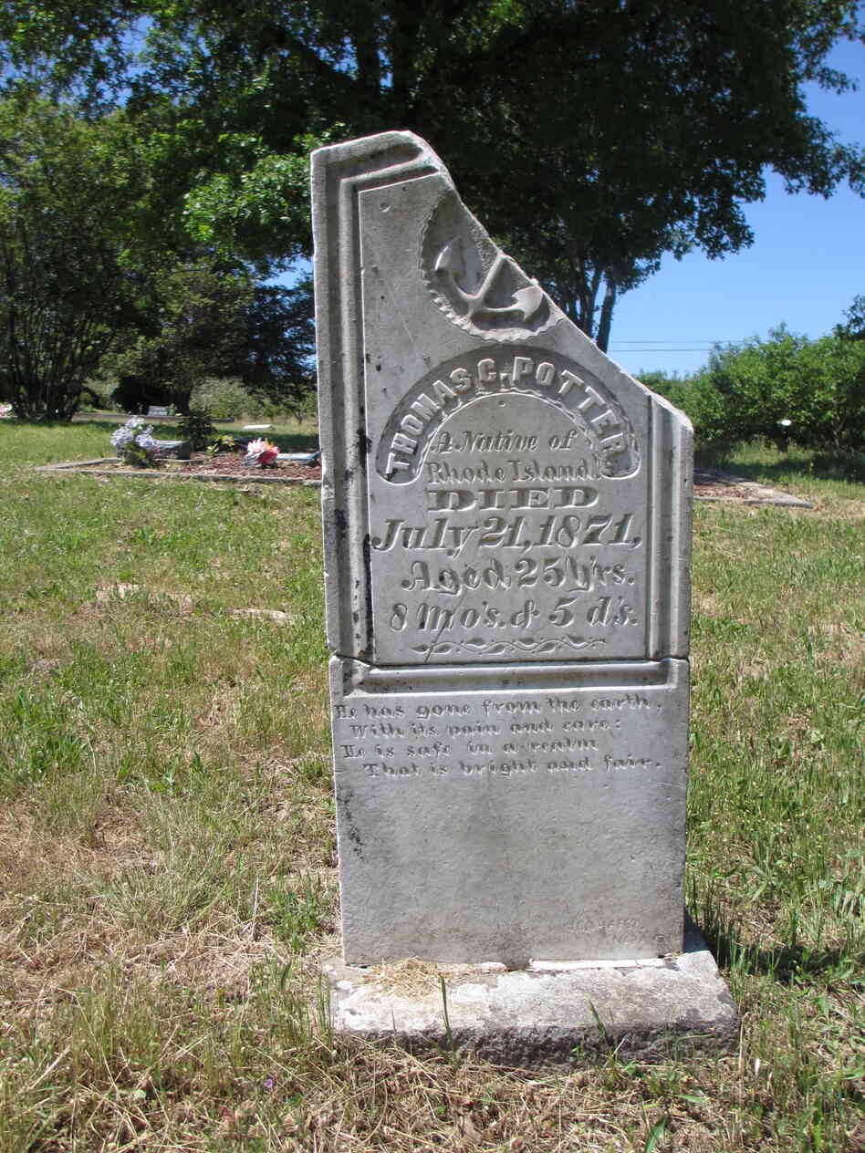 The partially restored headstone for Thomas C. Potter, who traveled west from Rhode Island, shows that he died on July 21, 1871, at age 25. The inscription reads, "He has gone from the earth, With its pain and care: He is safe in a realm That is bright and fair."
