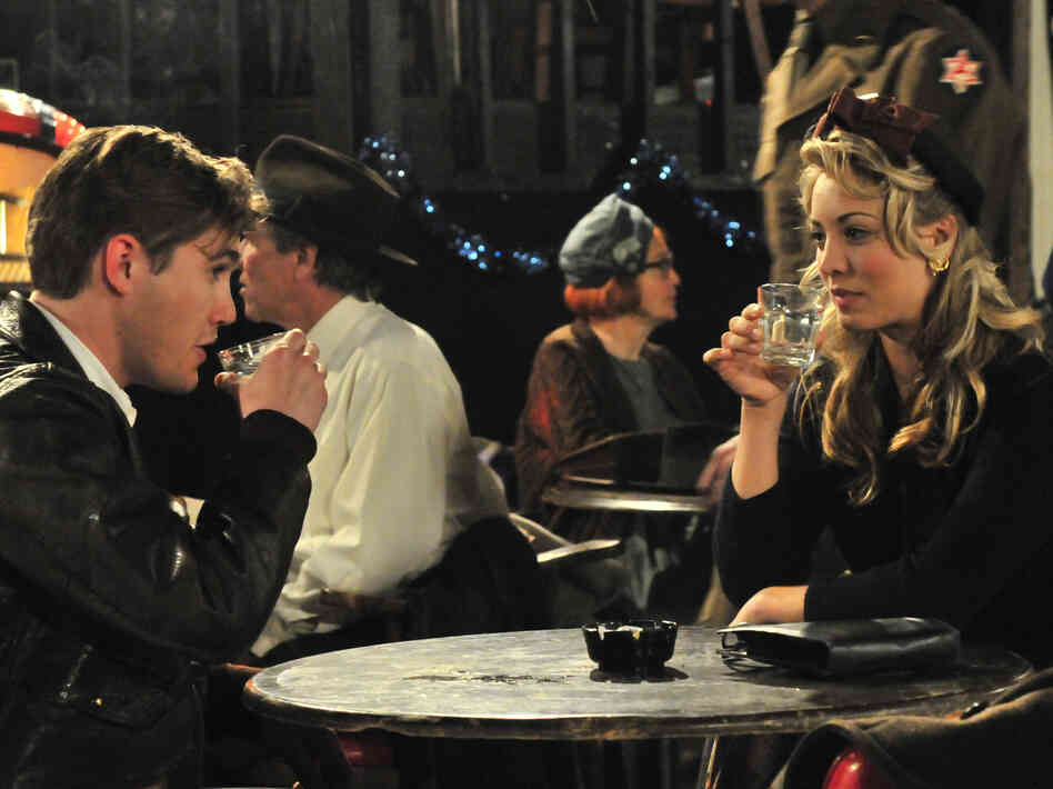 Silas has a drink with Wanda (Kaley Cuoco). The late-game love story shifts the movie's attention further away from its presumed subject, Hank Williams.