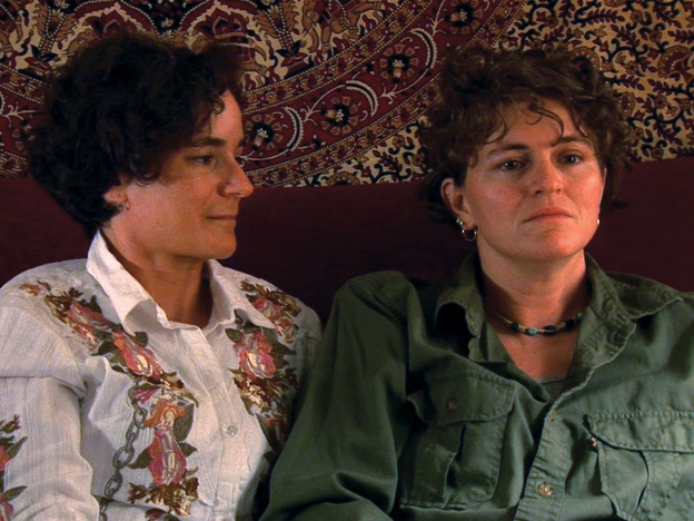Trina McDonald (right), who was sexually assaulted while serving in the U.S. Navy, sits with her wife. McDonald is one of several victims interviewed in The Invisible War.