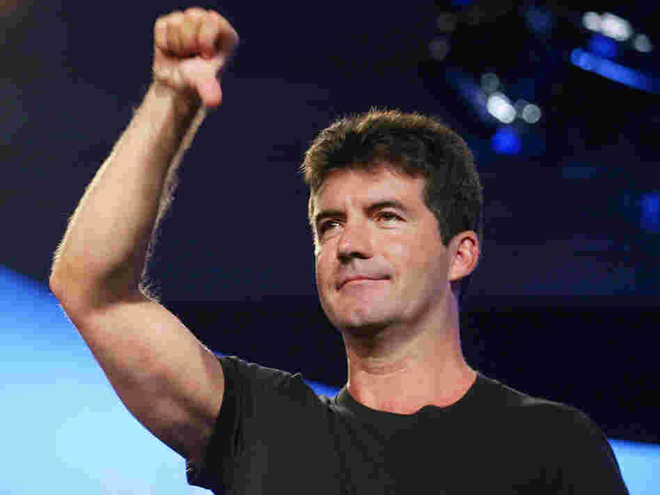 Simon Cowell in his early days as an American Idol judge. The success of Cowell and others shows that bullying is acceptable, says Eric Deggans, so long as it's done on reality TV.