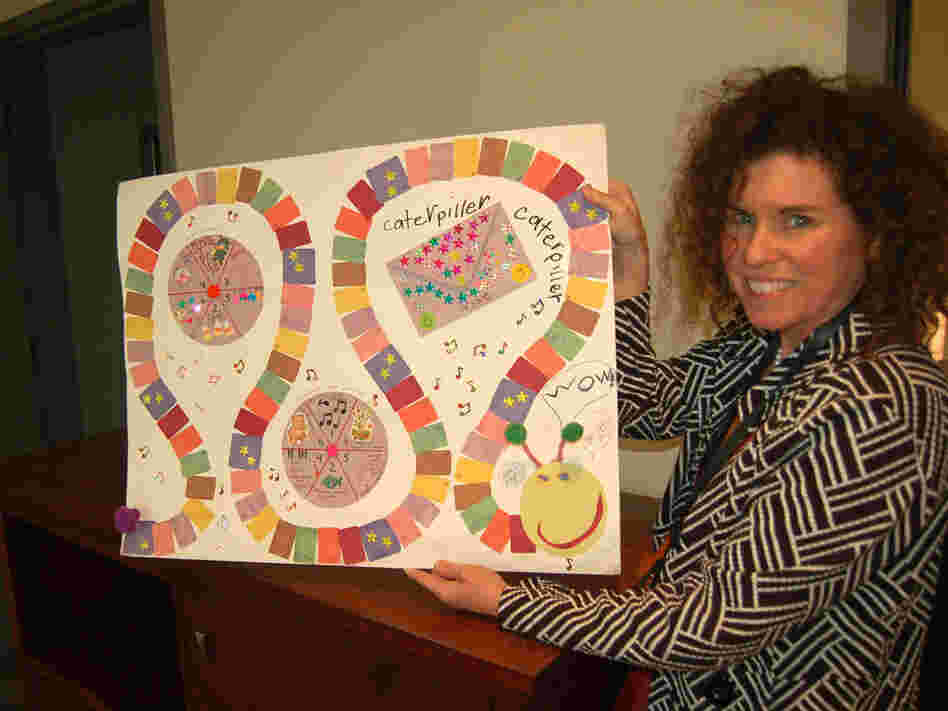 Eva Kennedy's mom shows off her homemade practice game.