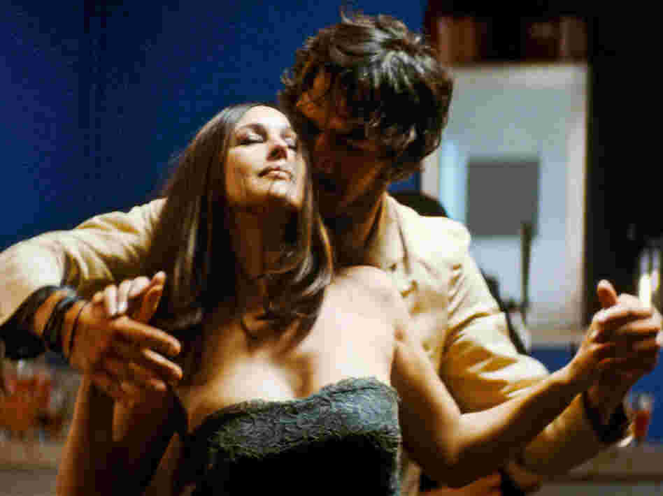 Paul (Jerome Robart) dances with Angele, a source of much jealousy for Paul's girlfriend, Elisabeth.
