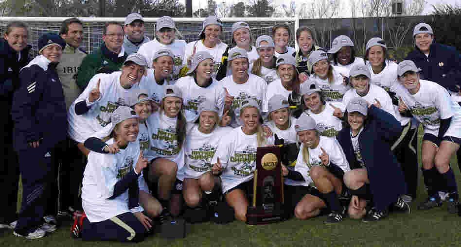 The adoption of Title IX has spurred growth in women's collegiate sports, including soccer. But a women's pro league has struggled, cutting its season short this year. Here, Notre Dame celebrates winning the NCAA College Cup in 2010.