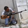 A Syrian rebel fires his weapon during clashes with Syrian troops near Idlib, in northern Syria, on June 15. The conflict has gone on for well over a year, but the international community has shown no appetite for a military intervention. A Syrian rebel fires his weapon during clashes with Syrian troops near Idlib, in northern Syria, on June 15. The conflict has gone on for well over a year, but the international community has shown no appetite for a military intervention.