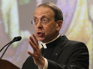 Archbishop William Lori, pictured speaking on religious freedom at the U.S. Conference of Catholic Bishops' annual fall assembly, says Catholics are behind the Fortnight for Freedom campaign. He dismissed a poll that found 57 percent of Catholics are not worried about their religious liberties.