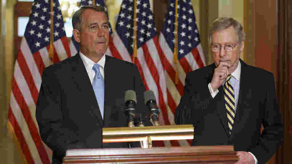 House Speaker John Boehner, R-Ohio (left) and Senate Minority Leader Mitch McConnell, R-Ky., on Capitol Hill in February. Republicans have been quick to criticize the president for bypassing Congress with his immigration action, but they've been unusually silent on the policy itself.