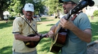CABOMA members play guitar and mandolin on a summer afternoon. CABOMA members play guitar and mandolin on a summer afternoon.