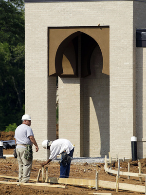 Construction employees work on the Islamic Center of Murfreesboro in Tennessee.