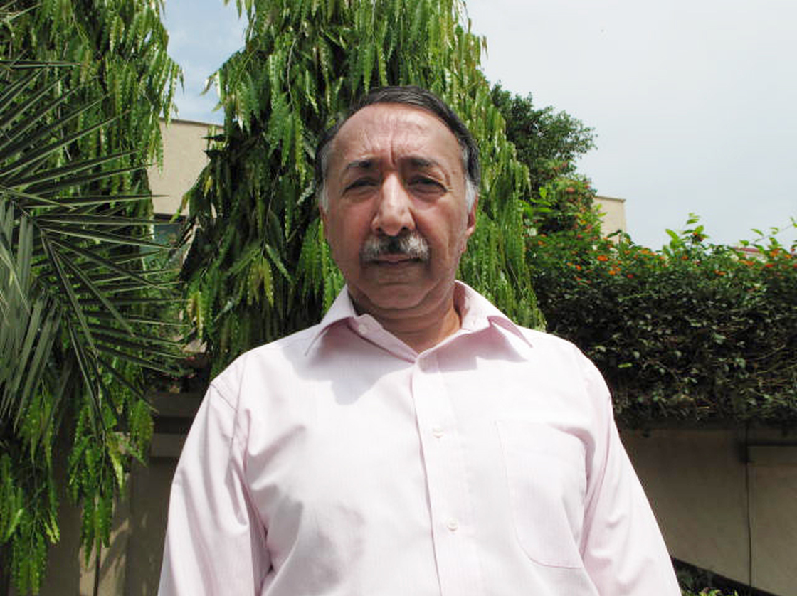 Retired senior police investigator Zafar Qureshi, 59, stands outside his home in Lahore, Pakistan, where security guards are stationed 24 hours a day. The former police official has probed some of the highest profile cases of official misconduct in Pakistan, and says he fears for his safety and that of his children in a country that he says is steeped in a "culture of corruption."