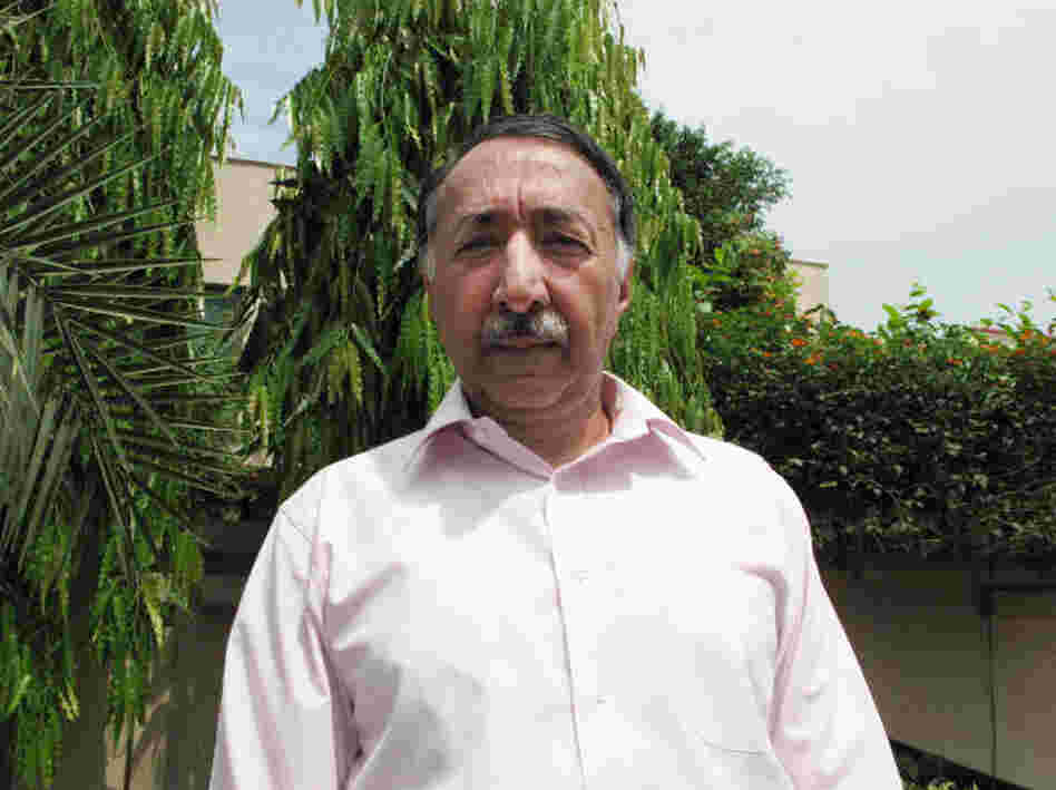 Retired senior police investigator Zafar Qureshi, 59, stands outside his home in Lahore, Pakistan, where security guards are stationed 24 hours a day. The former police official has probed some of the highest profile cases of official misconduct in Pakistan, and says he fears for his safety and that of his children in a country that he says is steeped in a "culture of corruption."