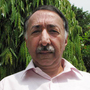 Retired senior police investigator Zafar Qureshi, 59, stands outside his home in Lahore, Pakistan, where security guards are stationed 24 hours a day. The former police official has probed some of the highest profile cases of official misconduct in Pakistan, and says he fears for his safety and that of his children in a country that he says is steeped in a "culture of corruption."