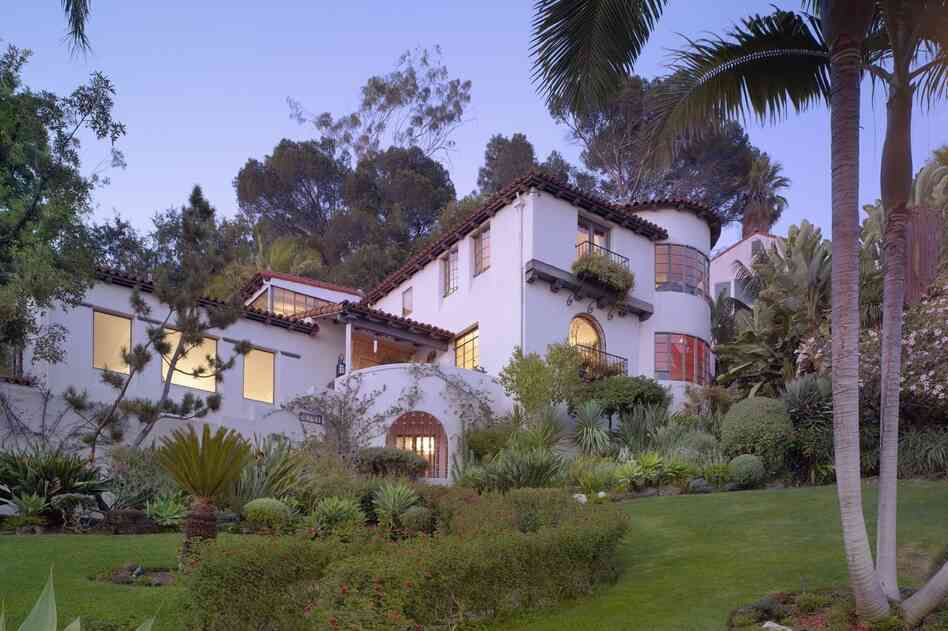 This Spanish Colonial Revival-style home is an example of how Williams worked with the existing landscape to make a home part of its natural surroundings. The window placement allows for views of the city skyline and the Hollywood Hills.