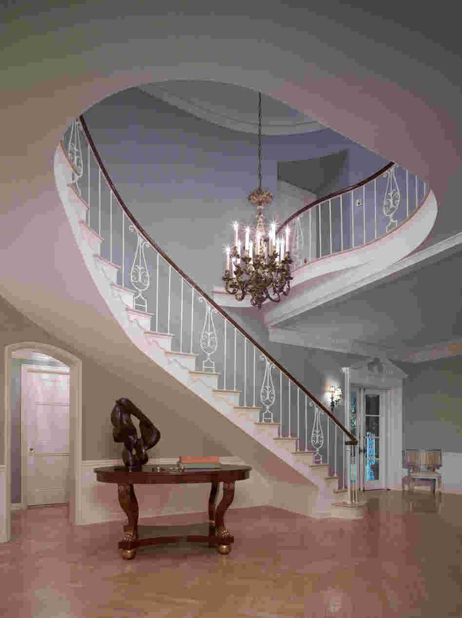 The staircase of the French Normandy-style Sensenbrenner residence, built in Beverly Hills in 1933, features a Williams trademark cherished by his homes' owners: a beautiful, sinuously curving staircase that was the focal point of the foyer. "He did the most beautiful entry halls I've ever seen," said real estate agent Bret Parsons.