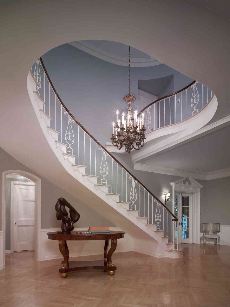 The staircase of the French Normandy-style Sensenbrenner residence, built in Beverly Hills in 1933, features a Williams trademark cherished by his homes' owners: a beautiful, sinuously curving staircase that was the focal point of the foyer. "He did the most beautiful entry halls I've ever seen," said real estate agent Bret Parsons.