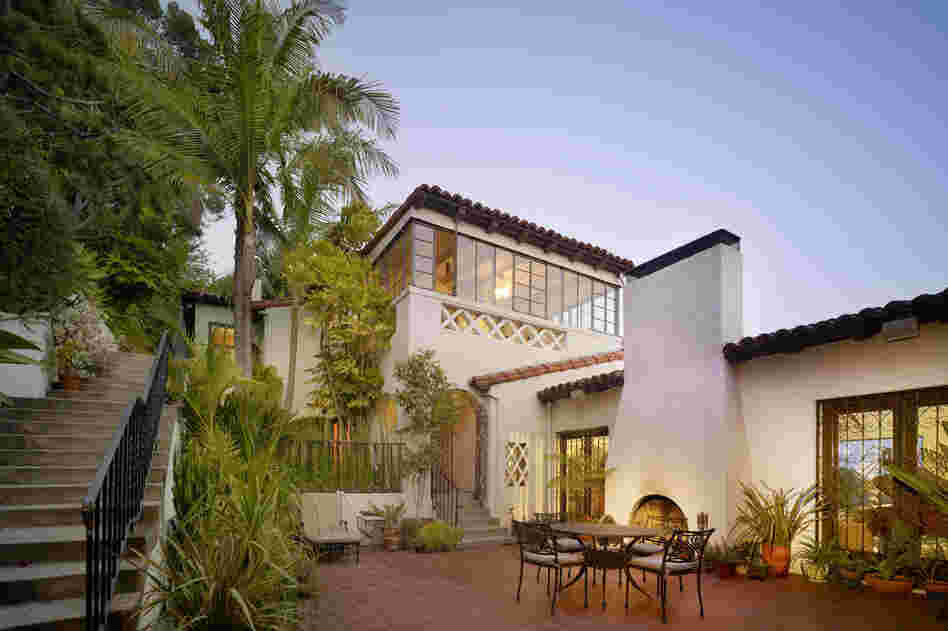 Williams was a great believer that the mild Southern California climate should be taken advantage of whenever possible. He created an "outdoor living room" on the patio of this home, with a fireplace and furniture that would encourage alfresco meals. The large patio doors also help diminish the demarcation between outdoors and indoors.