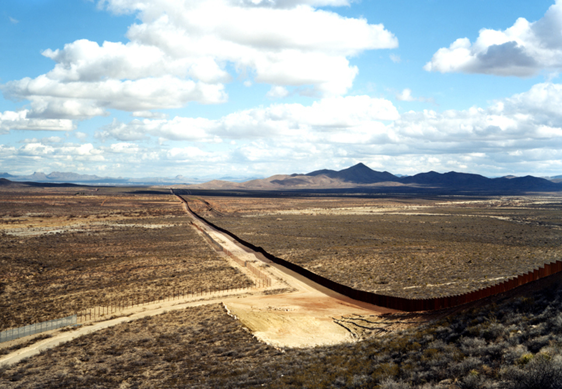 This photograph is included in an exhibition currently at the San Francisco Museum of Modern Art, Photography In Mexico. (Border fence, near Naco, Ariz., 2010)