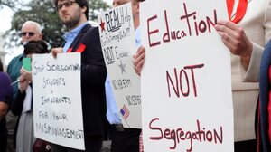 Demonstrators rally in February in opposition to a bill that proposed banning undocumented students from attending public higher education institutions in Georgia.