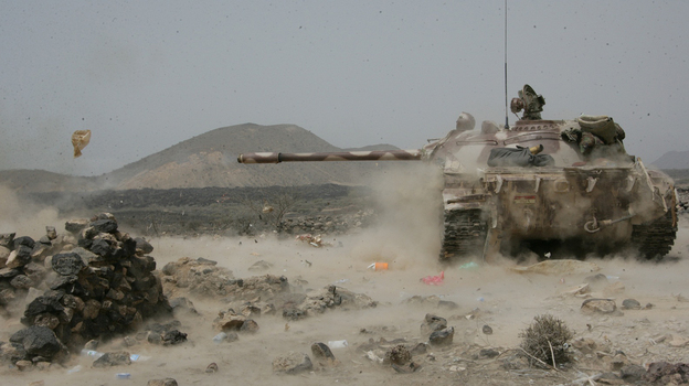 A Yemeni army tank fires at positions of al-Qaida militants near the coastal town of Shaqra, Yemen, last week, in a photo provided by Yemen's Defense Ministry. Yemen's army says it has pushed al-Qaida fighters out of towns in the south.