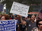 Protesters hold signs as they attend the 'Stand Up for Religious Freedom Rally', in front of the United States Courthouse on June 8, in Miami, Fla. Organizers voiced their opposition to Health and Human Services Mandate, which requires all employer-offered health insurance to cover contraceptives. Protesters hold signs as they attend the 'Stand Up for Religious Freedom Rally', in front of the United States Courthouse on June 8, in Miami, Fla. Organizers voiced their opposition to Health and Human Services Mandate, which requires all employer-offered health insurance to cover contraceptives.