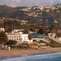 Housing counselors say a growing number of homeowners from wealthy communities, like Laguna Beach, Calif., are seeking to modify loans on multimillion-dollar properties.