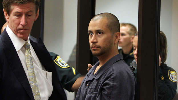 Defense attorney Mark O'Mara (left) with his client, George Zimmerman, at an April hearing related to second-degree murder charges in the killing of Trayvon Martin in Sanford, Fla.