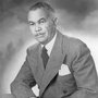 Architect Paul Williams (in a photo thought to be from the 1940s or '50s) developed the ability to sketch buildings upside down to accommodate white clients who might not want to sit next to him.