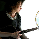 Simone White, from her video for the song "Flowers In May," from her 2012 album Silver Silver. Simone White, from her video for the song "Flowers In May," from her 2012 album Silver Silver.