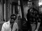 In The Connection, Leach (Warren Finnerty, right) and his friends wait around for their heroin fix, which eventually comes courtesy of Cowboy (Carl Lee). The controversial film was shut down in New York after two screenings in 1962. In The Connection, Leach (Warren Finnerty, right) and his friends wait around for their heroin fix, which eventually comes courtesy of Cowboy (Carl Lee). The controversial film was shut down in New York after two screenings in 1962.
