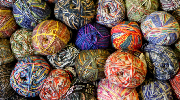 Note to the USOC: Those are balls of yarn, not puts. (AP)