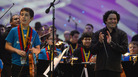 Gustavo Dudamel applauds the youngsters of Scotland's Big Noise Orchestra after their Thursday performance in Stirling. Gustavo Dudamel applauds the youngsters of Scotland's Big Noise Orchestra after their Thursday performance in Stirling.