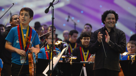 Gustavo Dudamel applauds the youngsters of Scotland's Big Noise Orchestra after their Thursday performance in Stirling. Gustavo Dudamel applauds the youngsters of Scotland's Big Noise Orchestra after their Thursday performance in Stirling.