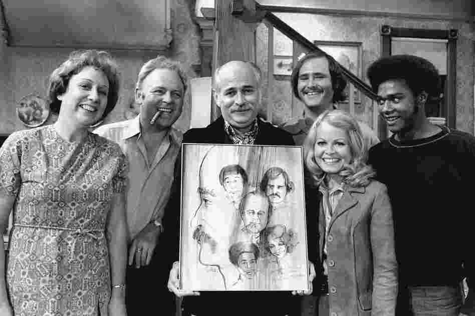 Norman Lear (center) created, developed and produced the hit show All in the Family, which ran from 1971 to 1979. The politically charged sitcom starred Jean Stapleton, Carroll O'Connor, Rob Reiner, Sally Struthers and Mike Evans.