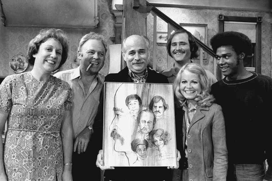 Norman Lear (center) created, developed and produced the hit show All in the Family, which ran from 1971 to 1979. The politically charged sitcom starred Jean Stapleton, Carroll O'Connor, Rob Reiner, Sally Struthers and Mike Evans.