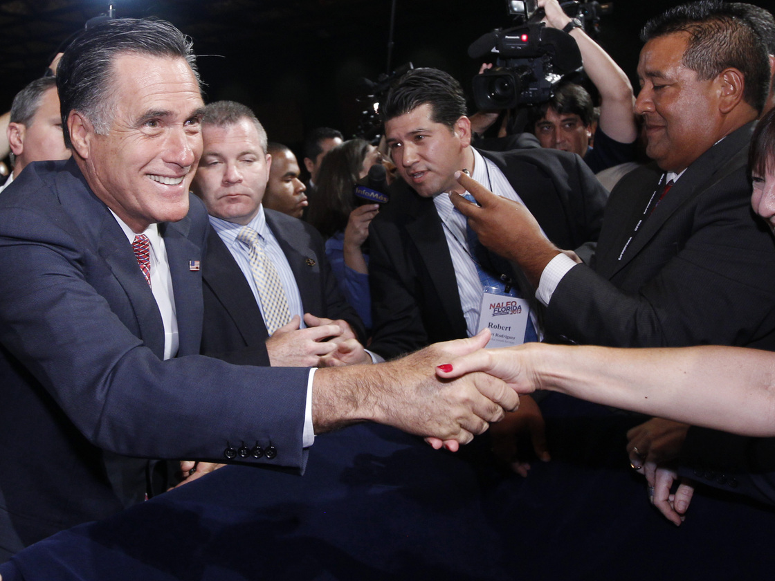 Republican presidential candidate Gov. Mitt Romney, greets attendees at the NALEO (National Association of Latino Elected and Appointed Officials) conference in Orlando, Fla., Thursday, June 21, 2012.