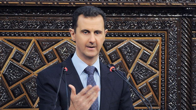 President Bashar Assad addresses Parliament on June 3. Syrians in the capital, Damascus, have become more willing to speak out, though they still don't want to be identified by name. Many feel the Assad regime is losing control of parts of the country.