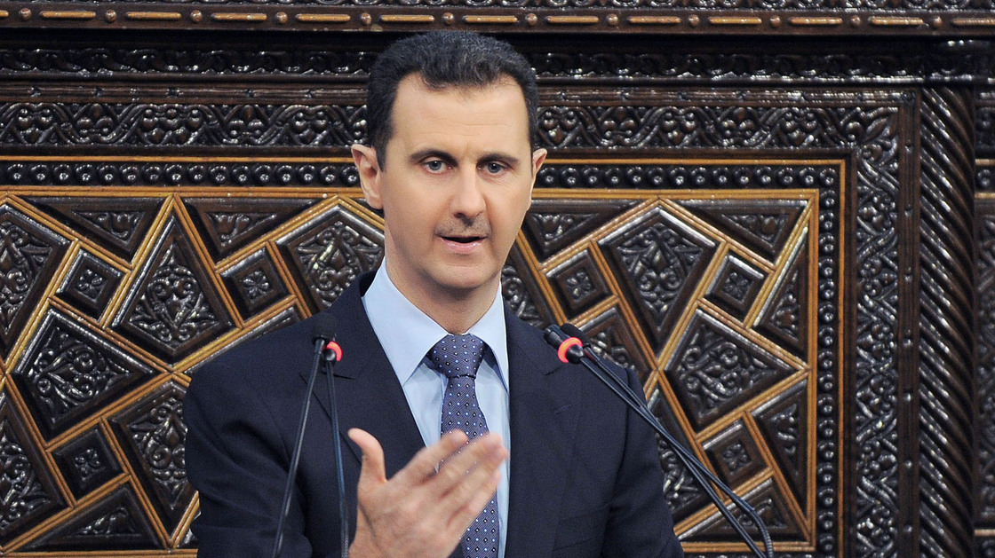President Bashar Assad addresses Parliament on June 3. Syrians in the capital, Damascus, have become more willing to speak out, though they still don't want to be identified by name. Many feel the Assad regime is losing control of parts of the country.