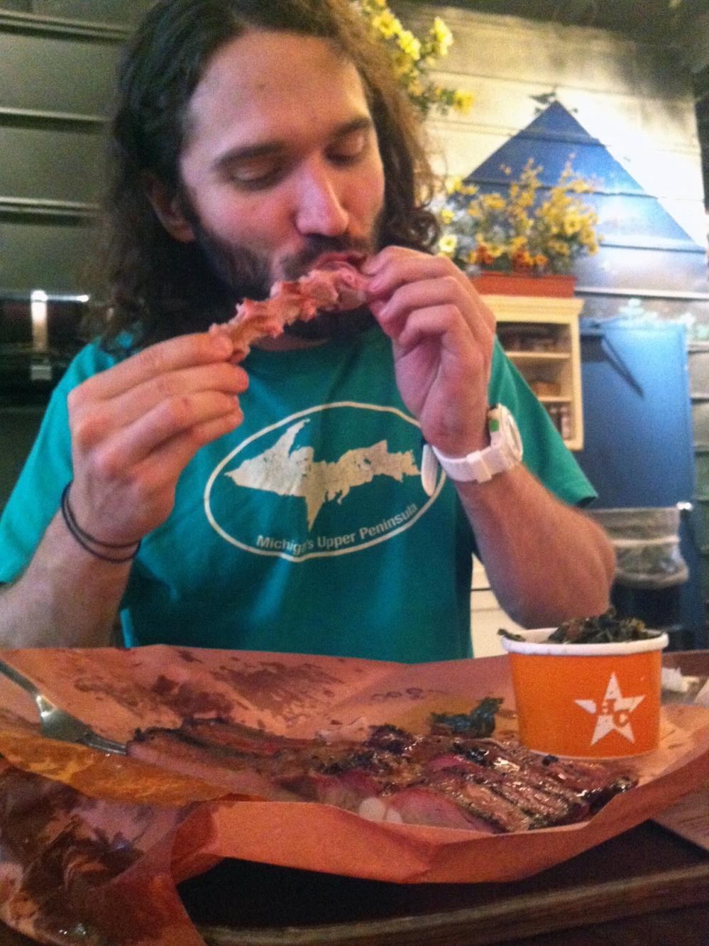Paleo diet promoter John Durant digs into some ribs.
