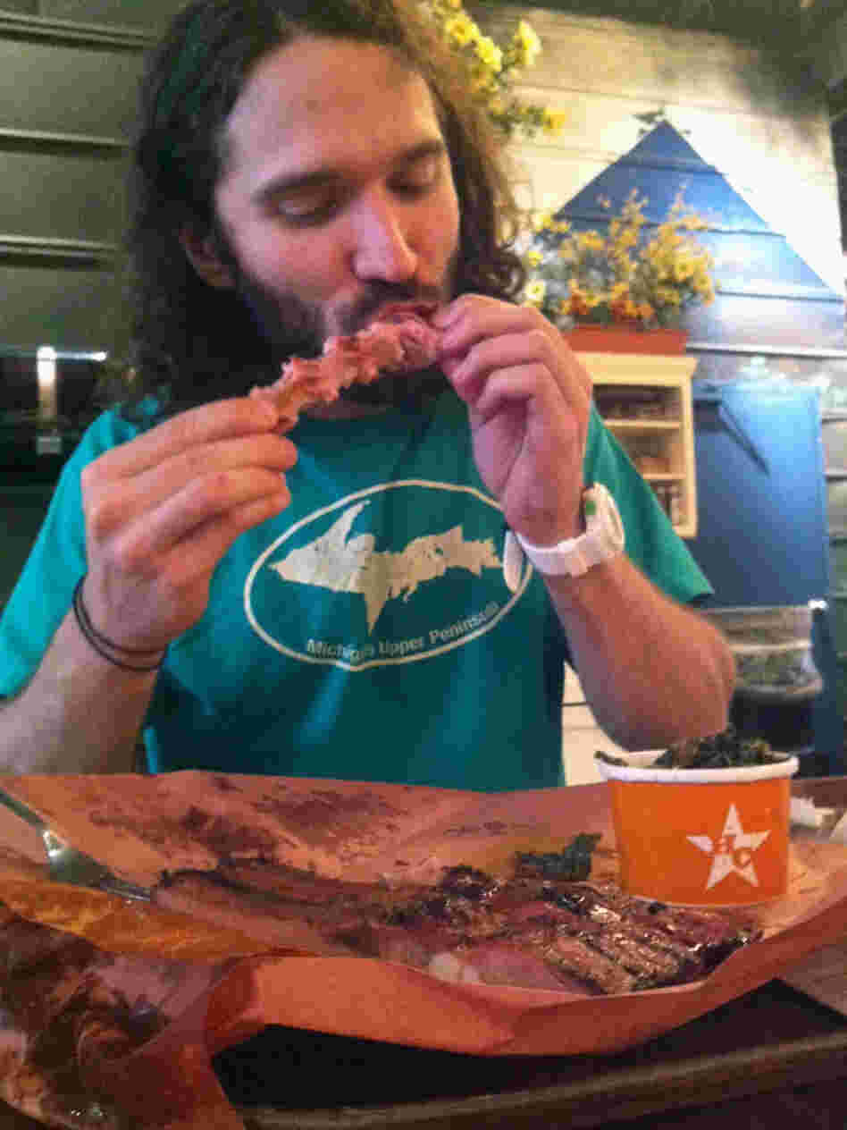 Paleo diet promoter John Durant digs into some ribs.