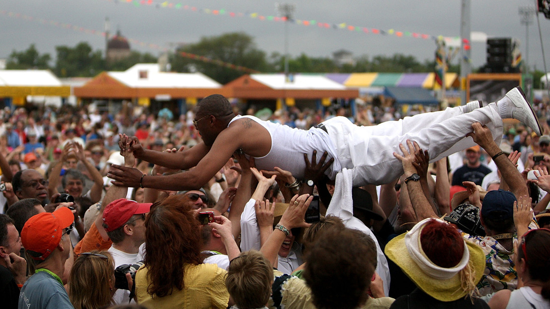 Glen David Andrews, the New Orleans trombonist and singer and regular on HBO's Treme, surfs the crowd at the 2010 New Orleans Jazz & Heritage Festival.