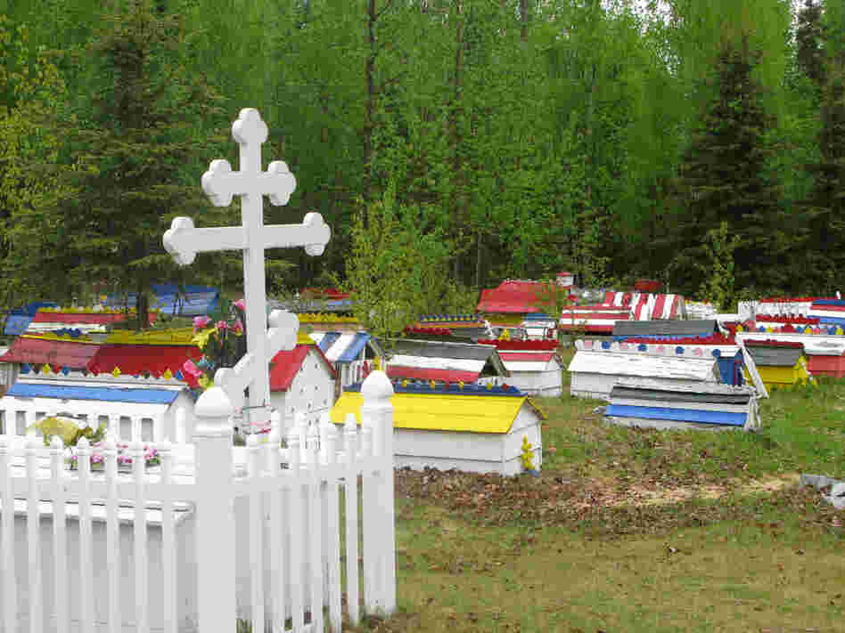 A plot in the Eklutna Cemetery features a traditional three-barred Russian Orthodox cross.