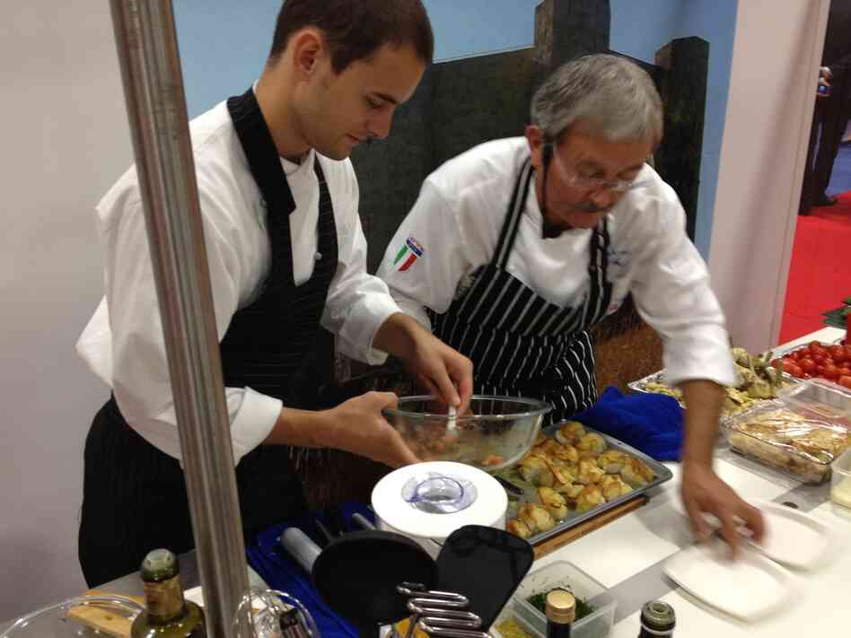 Chef Mino Massi and his son Robi prep food from Puglia at the Washington, D.C. convention center.