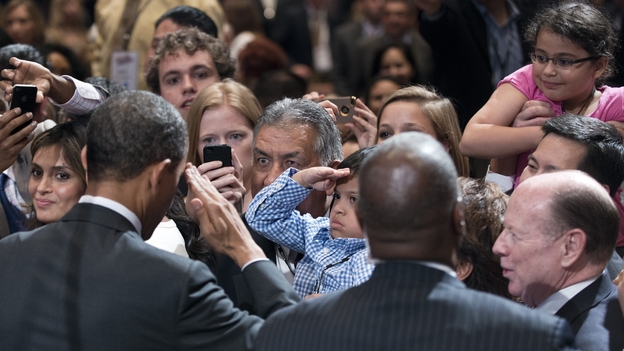 President Obama returned a young fan's salute at the conference of the National Association of Latino Elected Officials in Orlando, Fla.