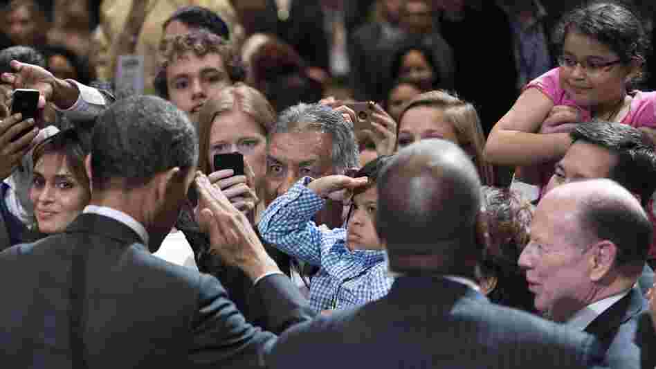 President Obama returned a young fan's salute at the conference of the National Association of Latino Elected Officials in Orlando, Fla.