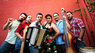Singer Marisol Hernandez (center) takes listeners from her grandfather's burro cart to La Santa Cecilia's Latin Grammy Award, on Olvera Street in Los Angeles. Singer Marisol Hernandez (center) takes listeners from her grandfather's burro cart to La Santa Cecilia's Latin Grammy Award, on Olvera Street in Los Angeles.