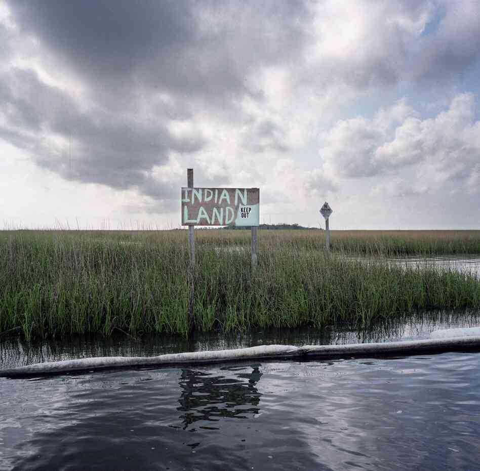 Stranded Indian Land with Oil Boom, after the British Petroleum Oil Spill, South of Point-aux-Chenes, Louisiana, 2010