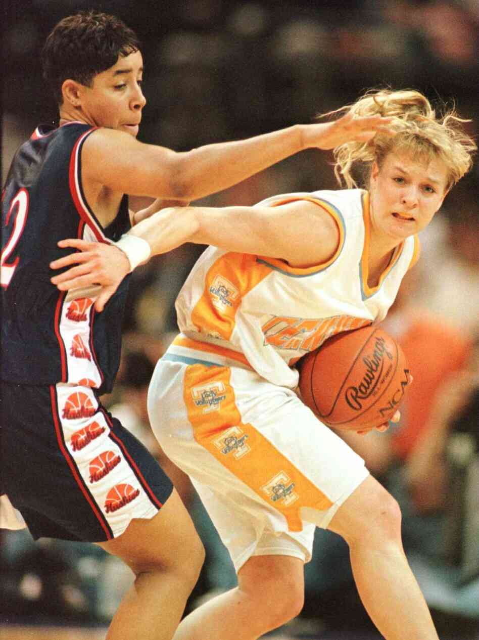 Michelle Marciniak (right) of the University of Tennessee Lady Volunteers attempts to elude the defensive pressure of Nykesha Sales of the UConn Huskies during the 1996 NCAA Women's Final Four.