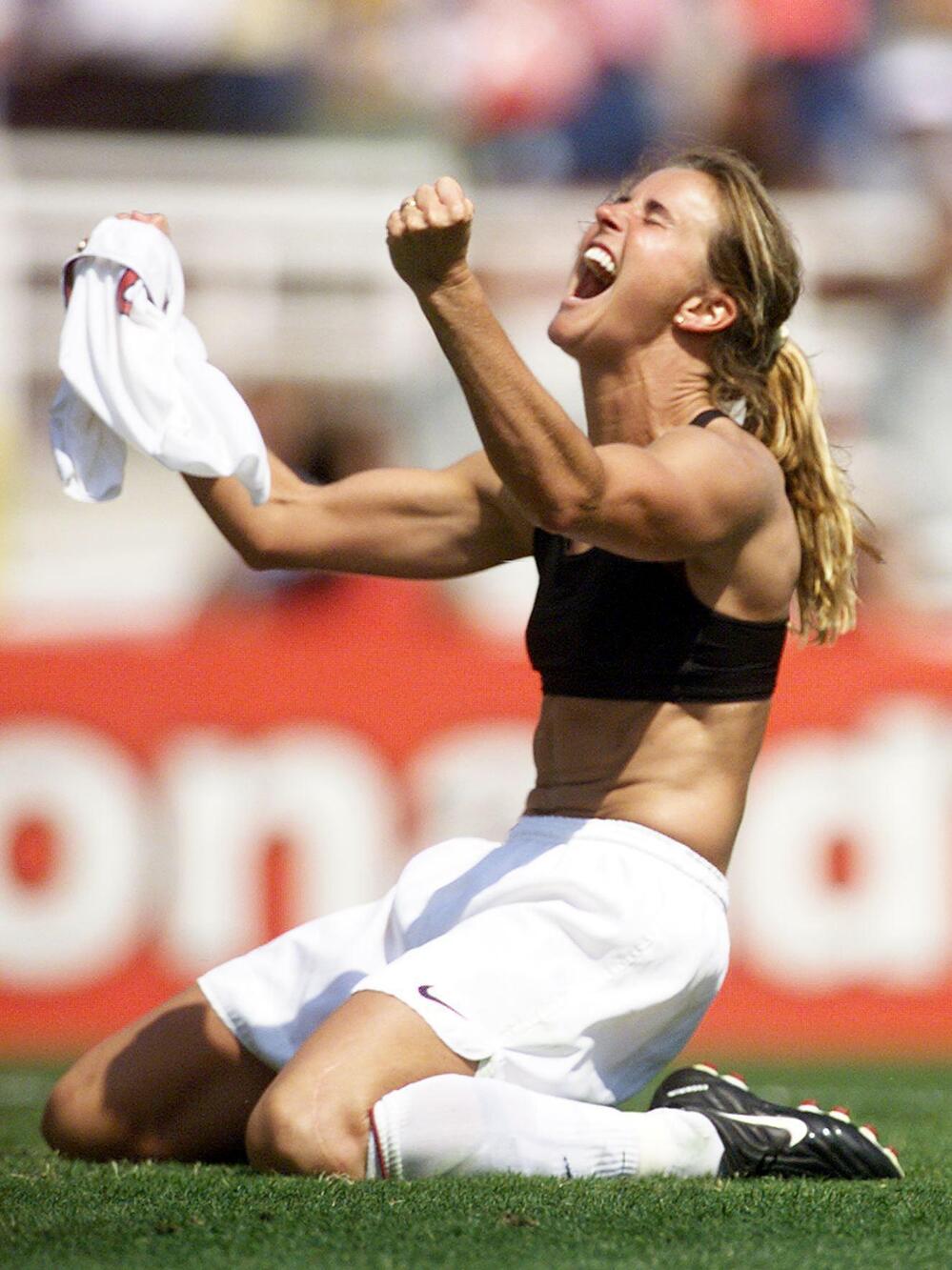 Brandi Chastain celebrates after kicking the winning penalty shot to win the 1999 Women's World Cup final at the Rose Bowl in Pasadena, Calif., in 1999.