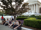 People wait outside the Supreme Court last week for word on the fate of the federal health overhaul law. People wait outside the Supreme Court last week for word on the fate of the federal health overhaul law.