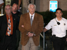 Former Penn State assistant football coach Jerry Sandusky leaves court in handcuffs Friday after being convicted in his child sex abuse trial at the Centre County Courthouse in Pennsylvania. Former Penn State assistant football coach Jerry Sandusky leaves court in handcuffs Friday after being convicted in his child sex abuse trial at the Centre County Courthouse in Pennsylvania.